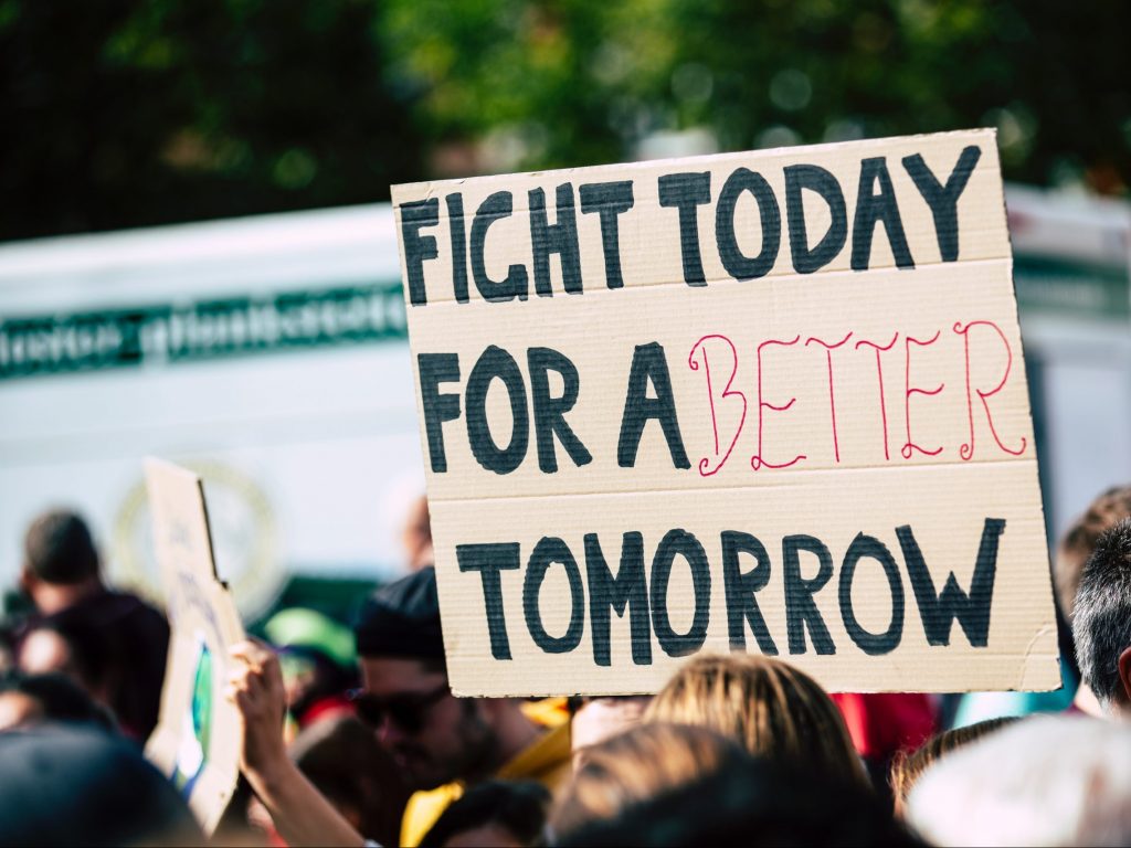 a sign that reads, fight today for a better tomorrow