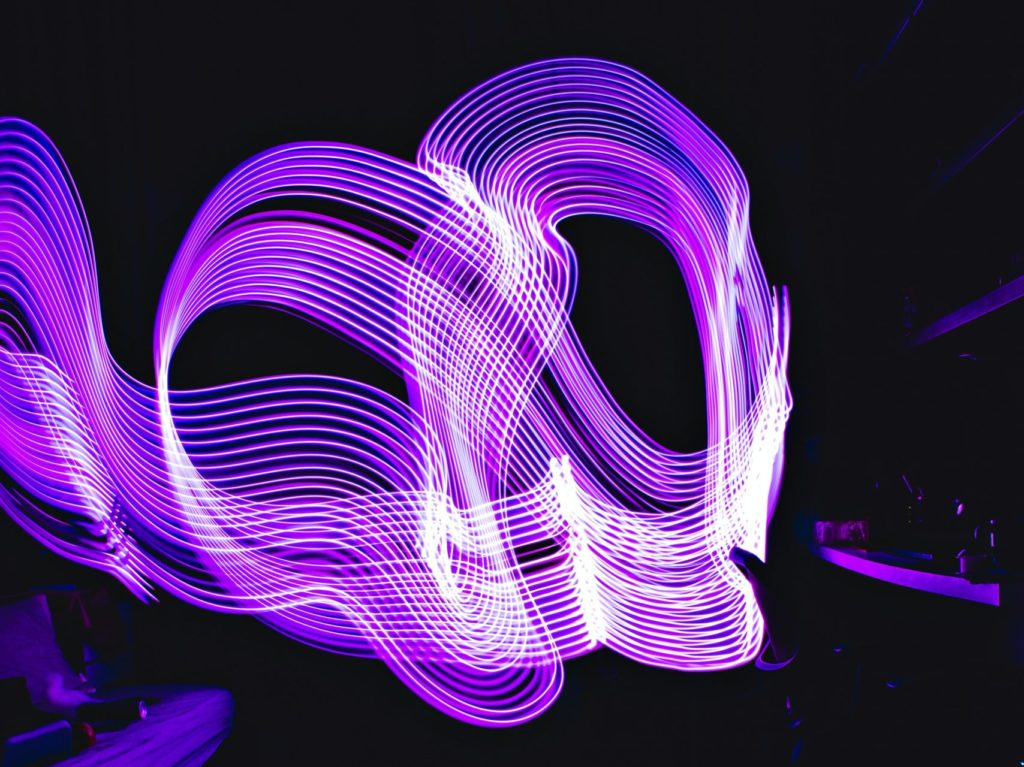 representation of sound waves in purple