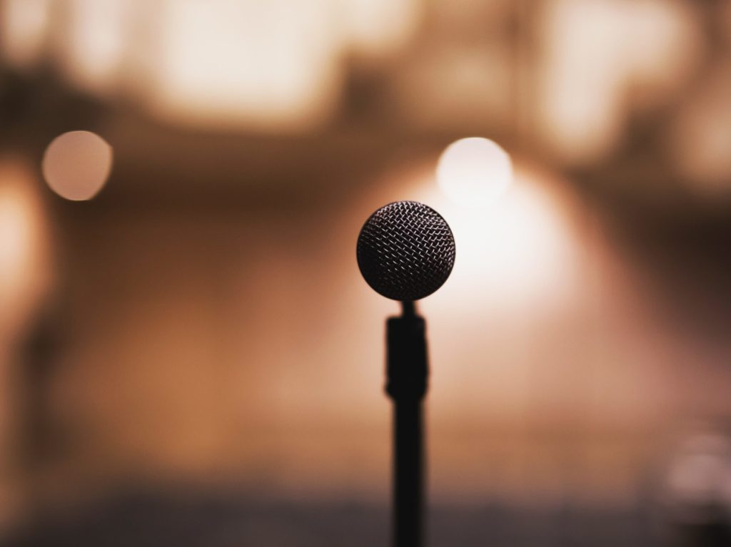 a microphone in front of blurry background