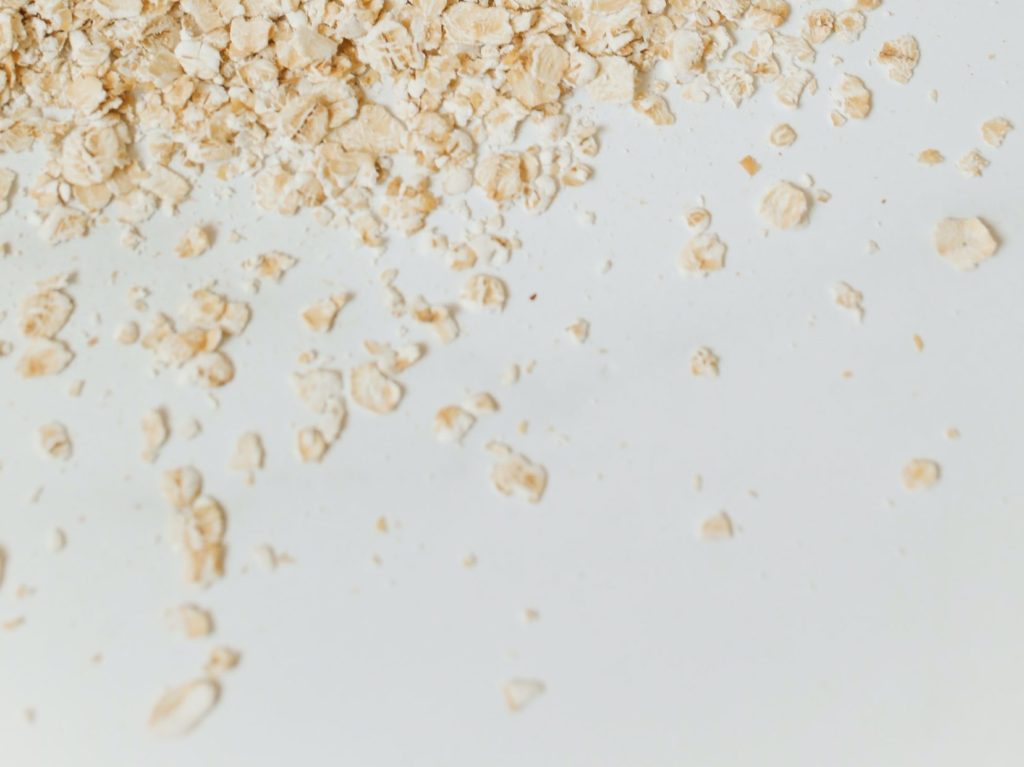 oatmeal scattered on a white surface