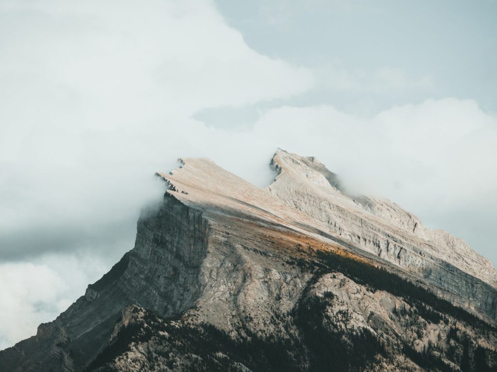 a mountain peak amidst the clouds